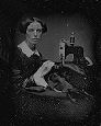 victorian photo of woman at sewing machine